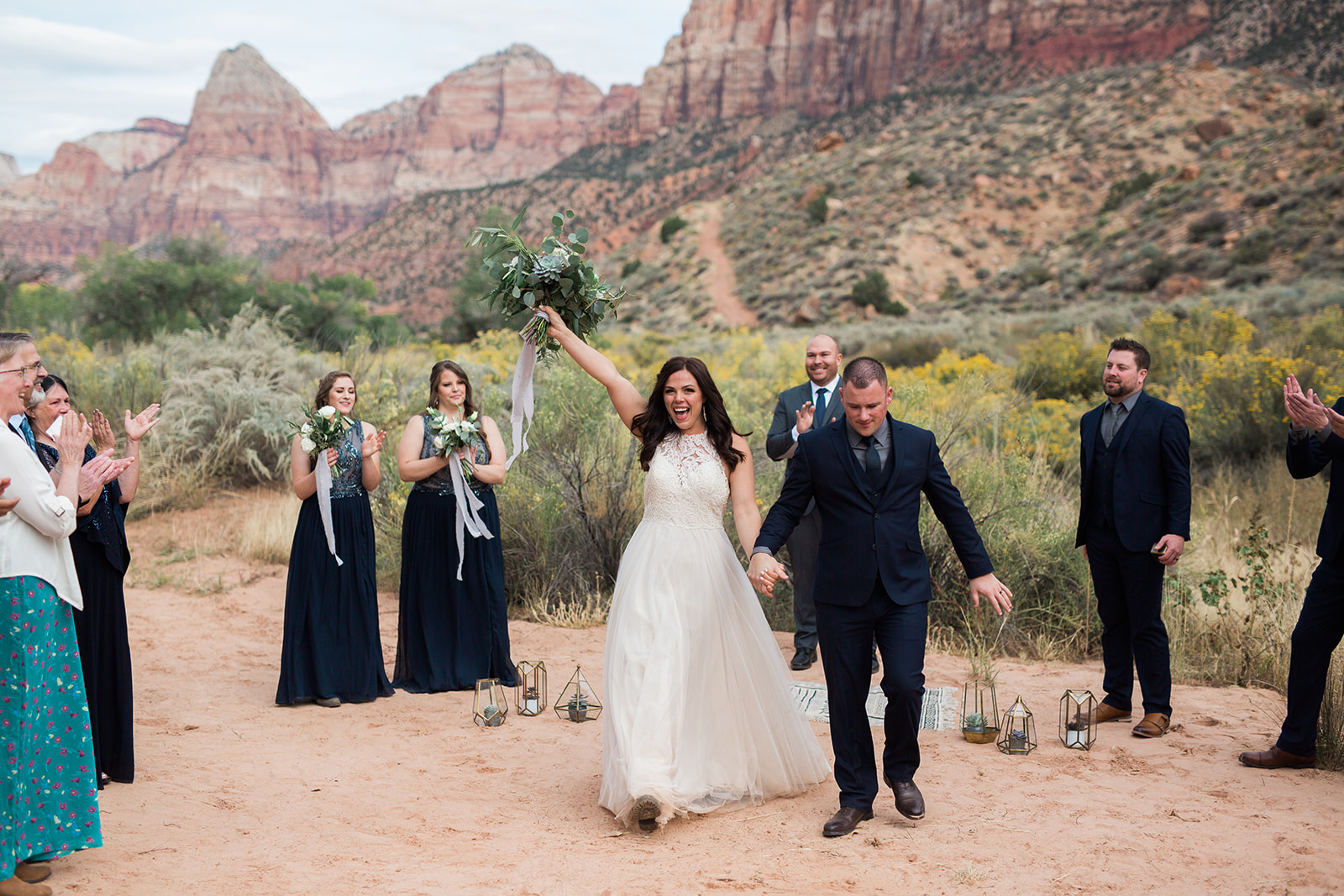 Bride and Groom walk back down the aisle after elopement in Zion National Park