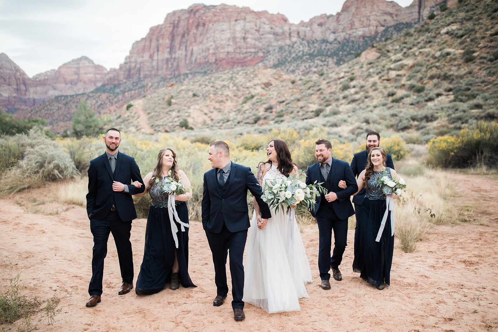bridal party poses in Zion National Park before elopement