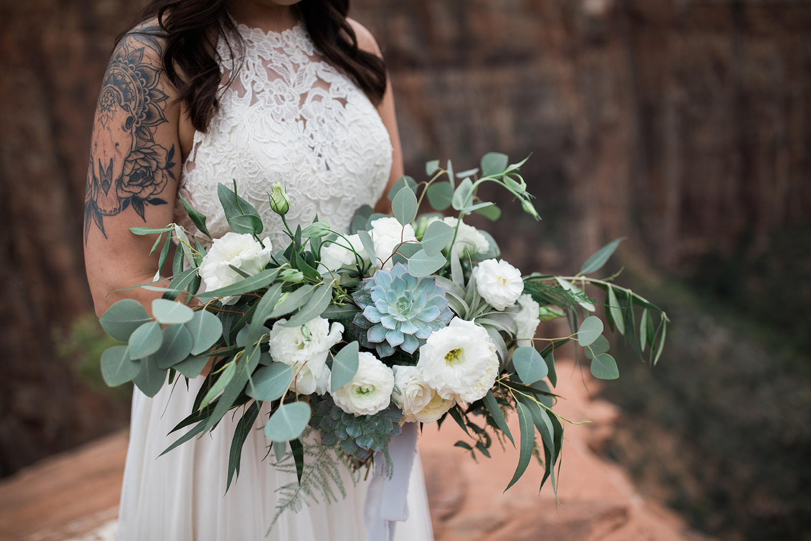 bride's bouquet against sandstone