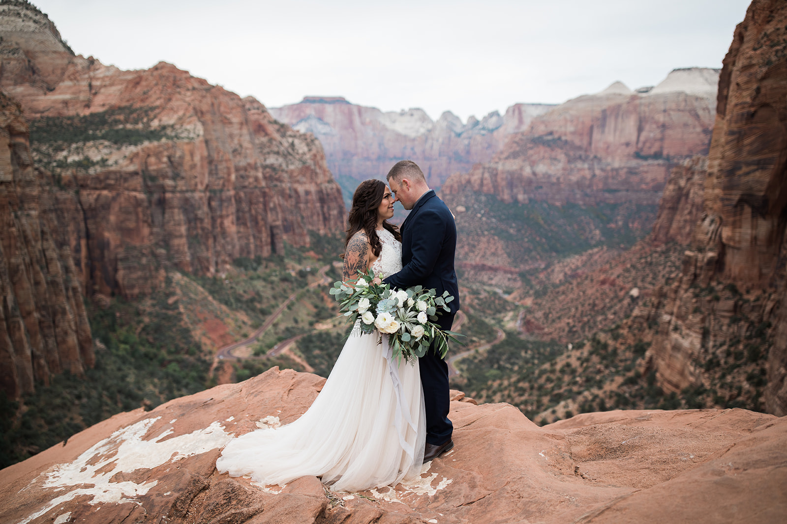 bride and groom, mountain overlook in Zion National Park
