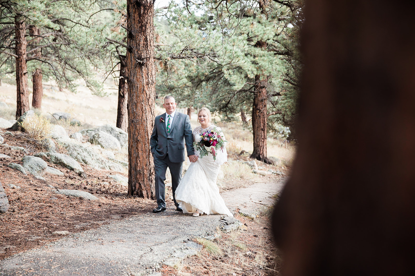 father of the bride walking bride to the aisle for rocky mountain elopement
