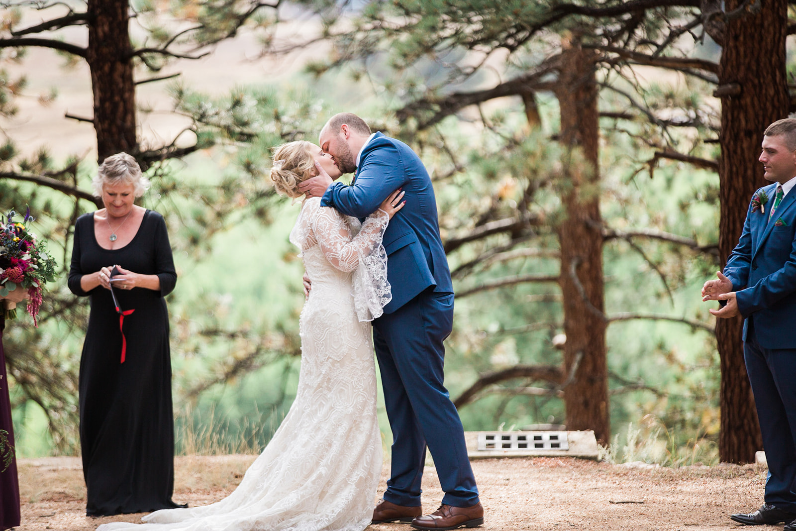 rocky mountain colorado elopement, bride and groom first kiss