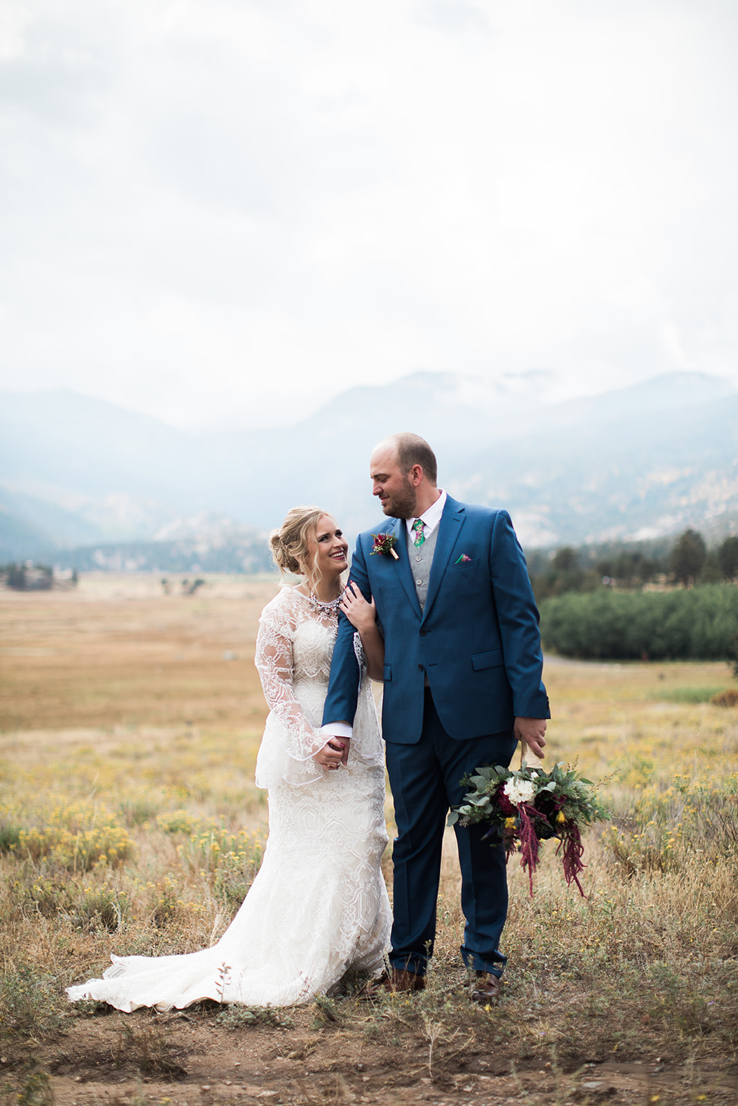 groom sees bride for rocky mountain elopement for first time