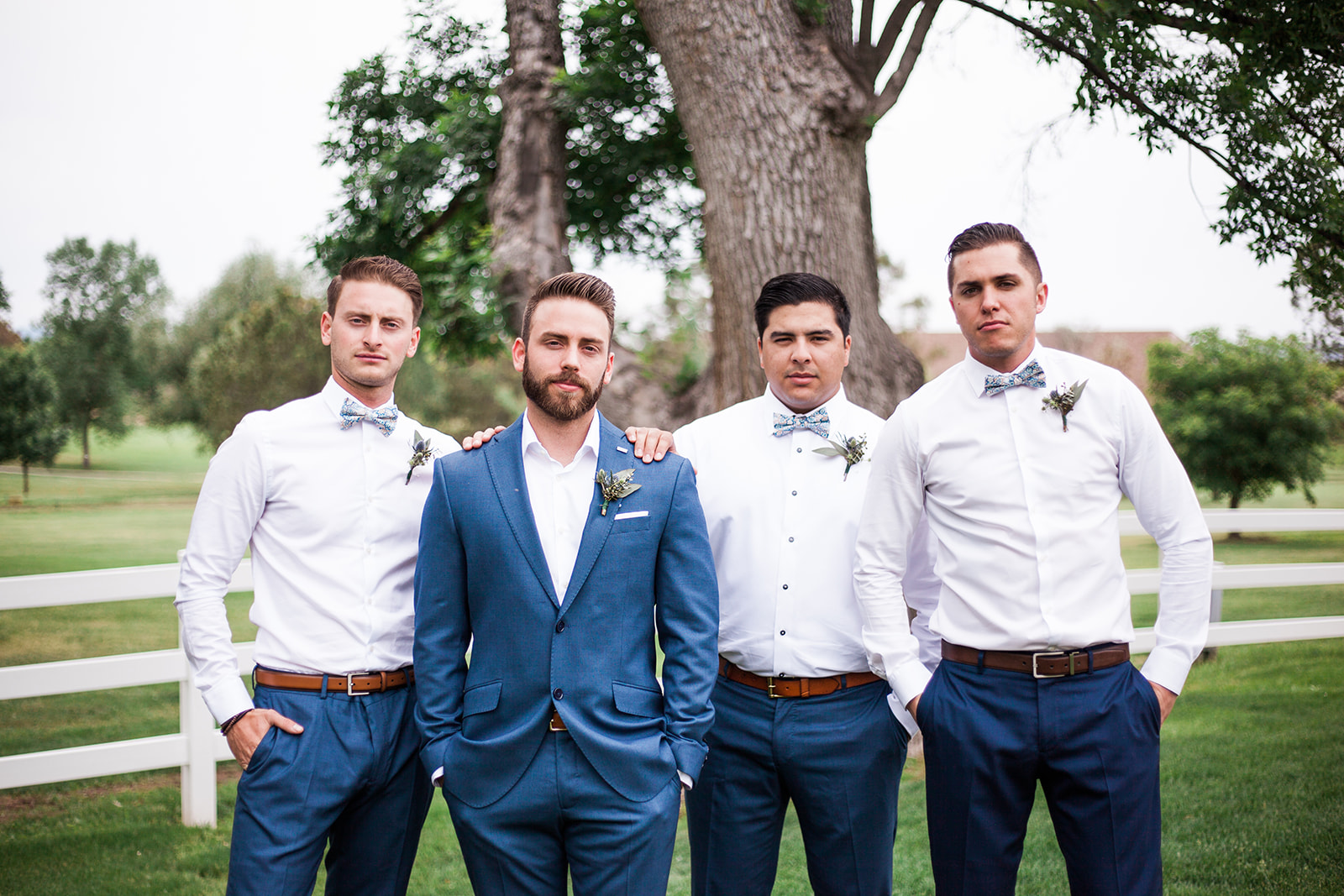 groom and groomsmen raccoon creek colorado wedding