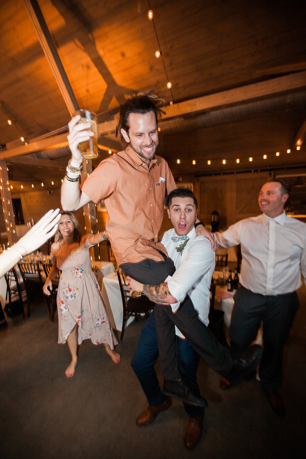 guests dance at wedding reception
