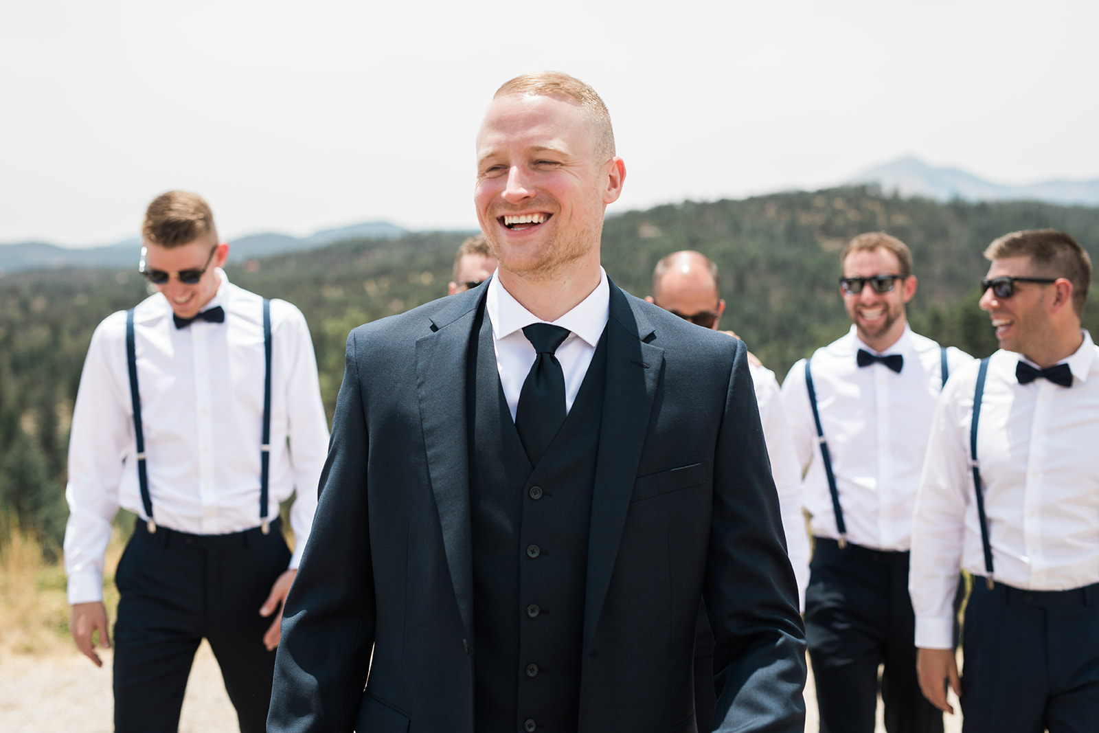 groom smiling in New Mexico wedding session
