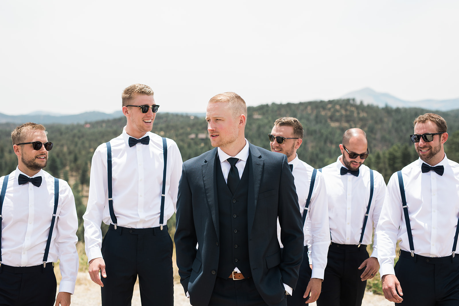 groom and groomsmen getting ready for New Mexico winery wedding