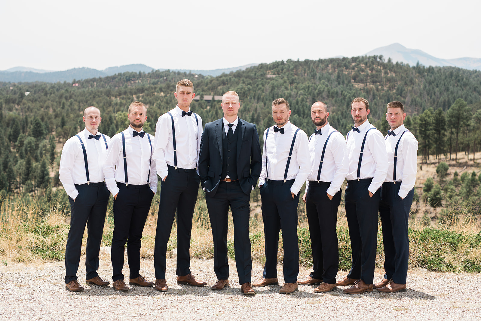 groom and groomsmen getting ready for New Mexico winery wedding