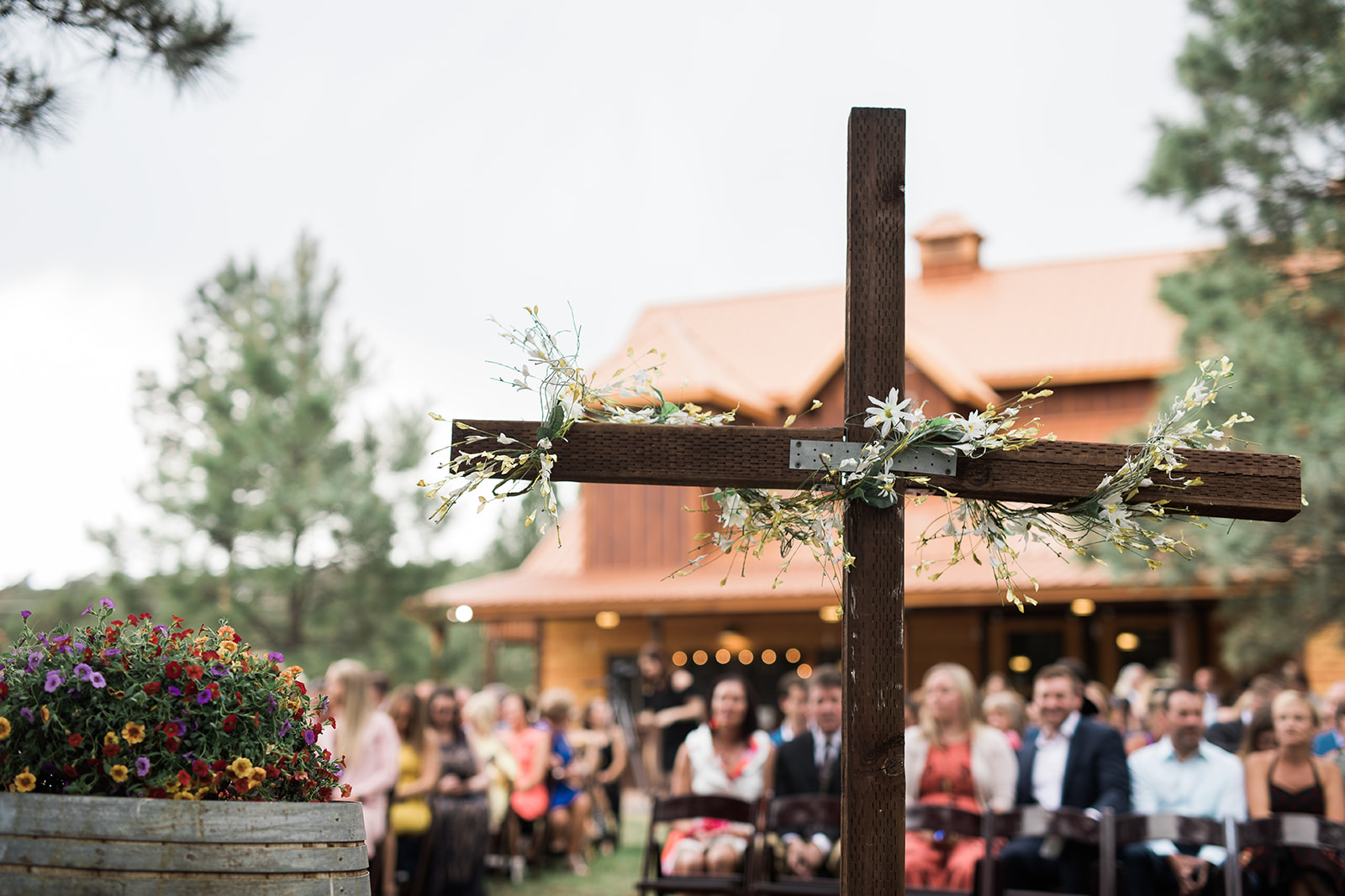 flowers on a cross alter at wedding