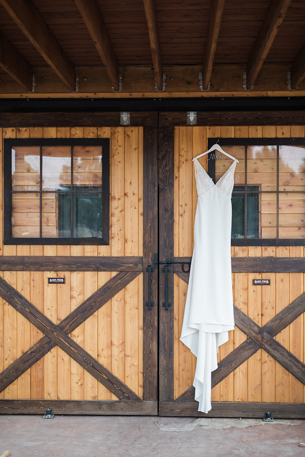 bride's dress at barn at winery wedding