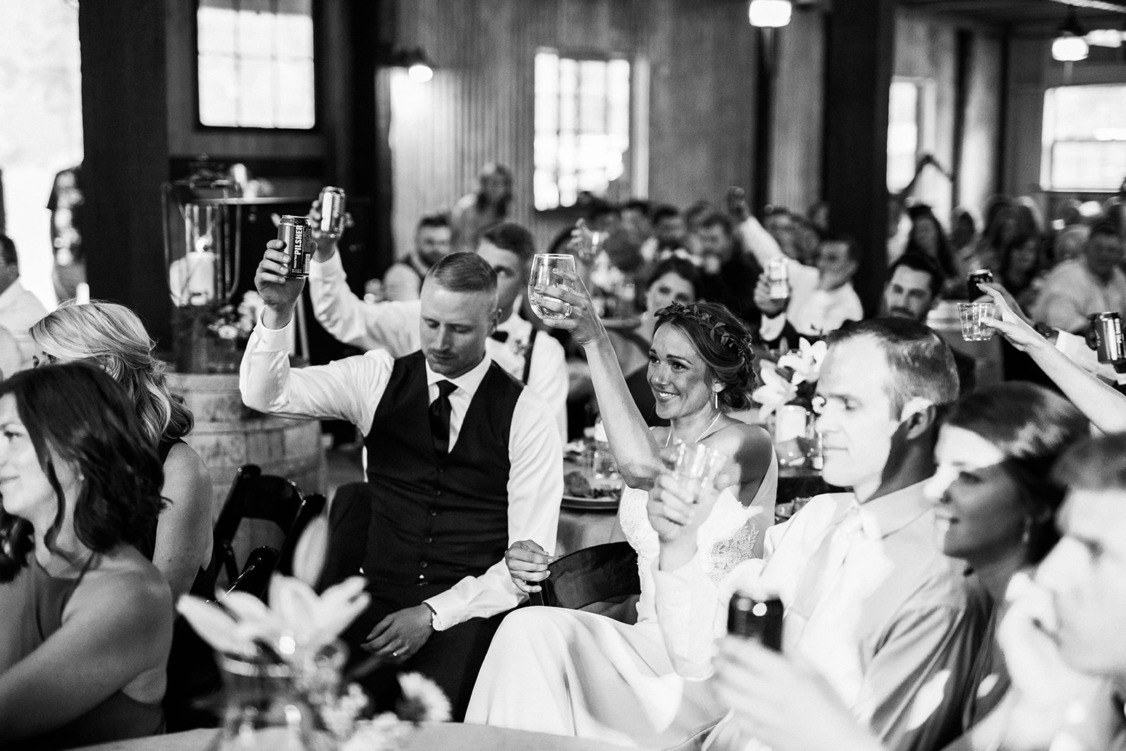 the crowd saluting the bride and groom