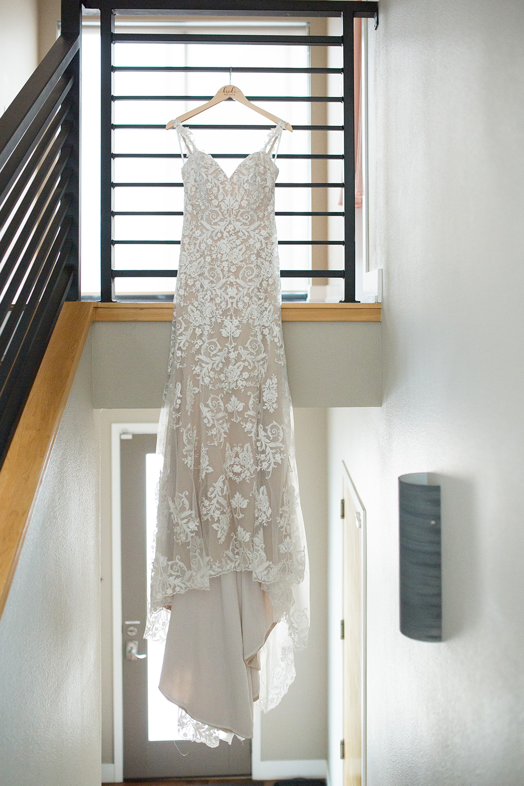 dress hanging on stairs