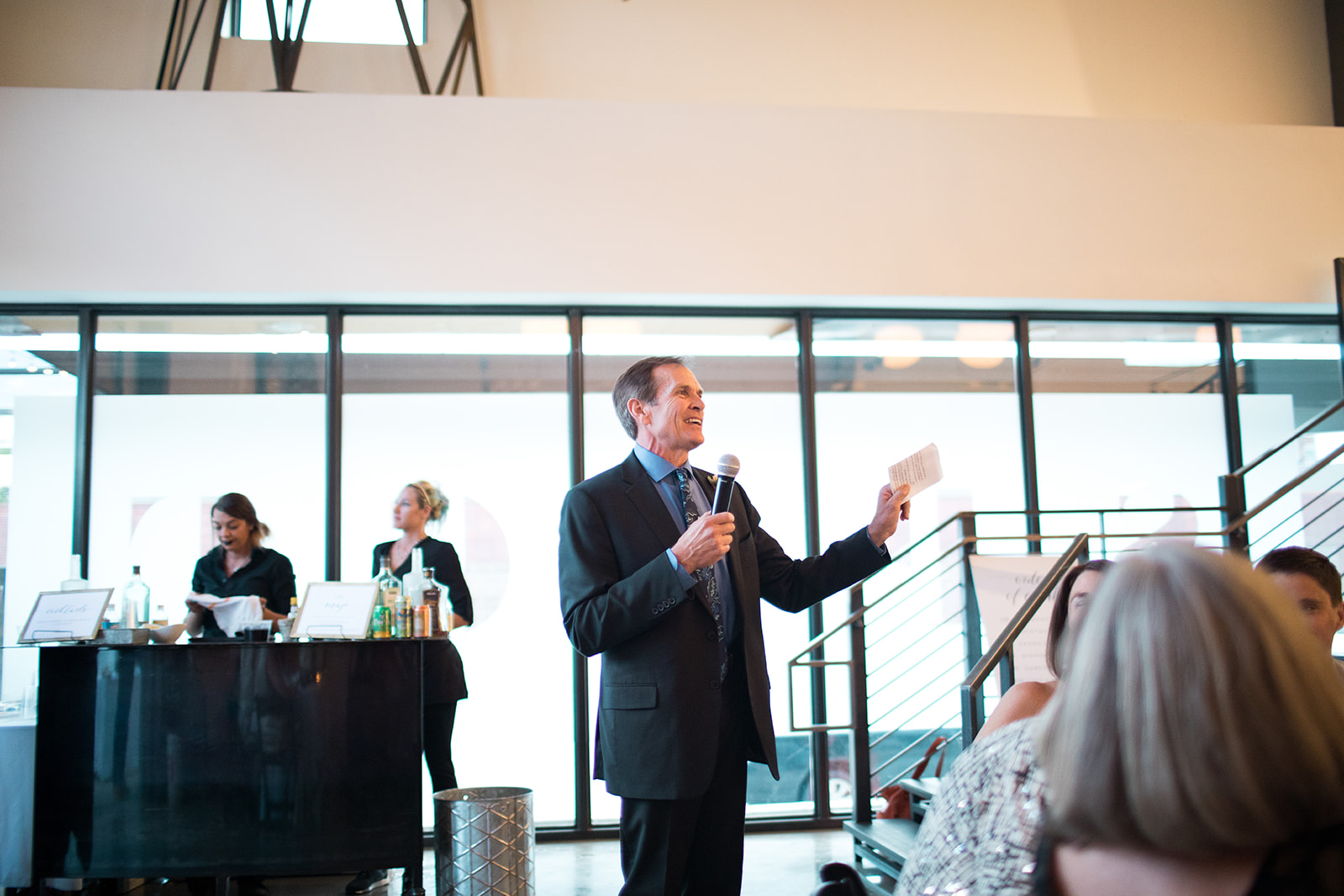 guest giving a toast at Denver Space Gallery wedding reception