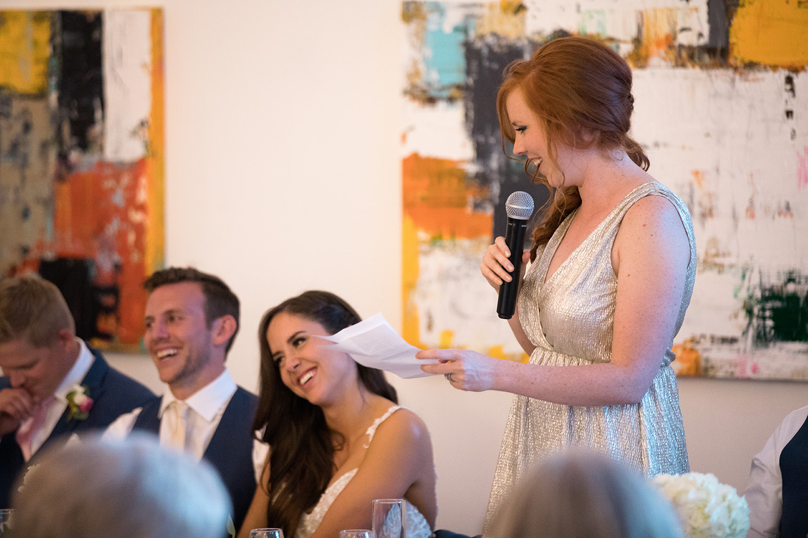 guest giving a toast at Denver Space Gallery wedding reception