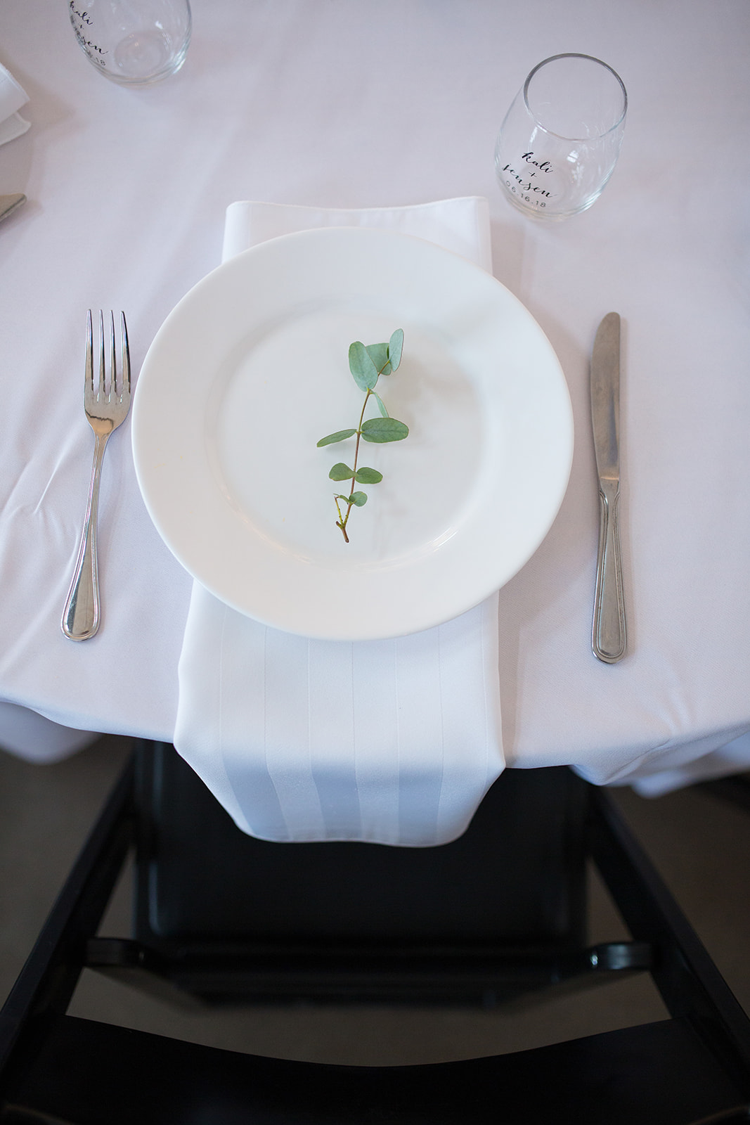 place settings with leaf on white plate