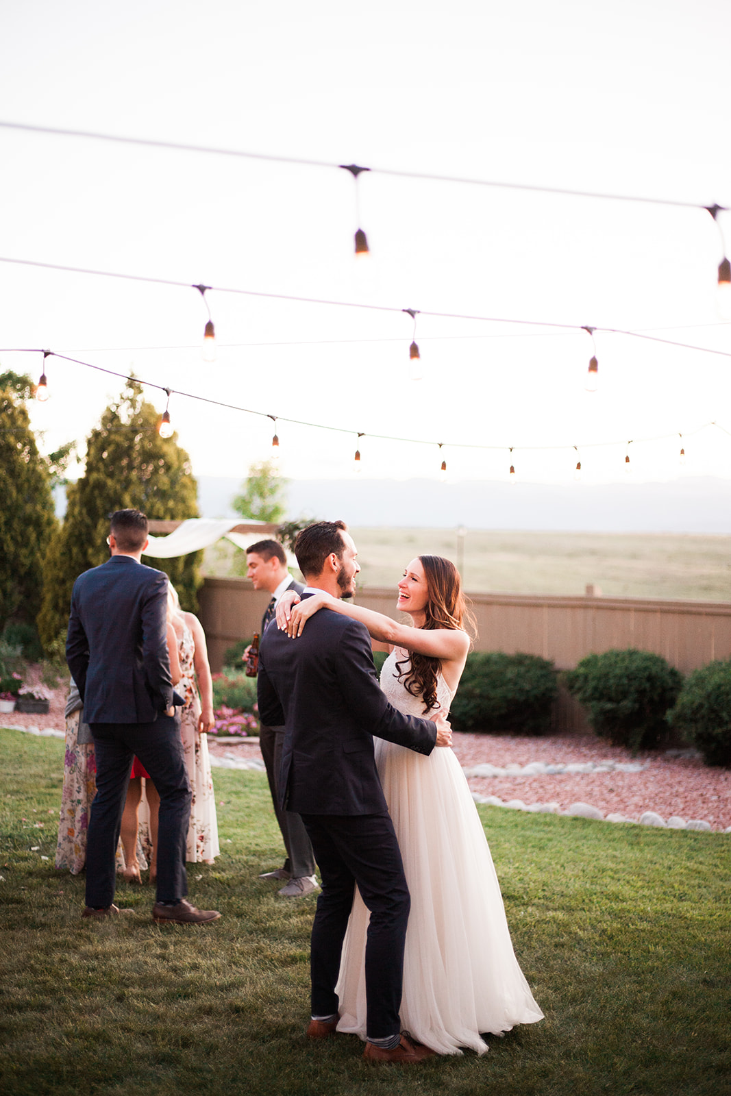 bride and groom dancing at their outdoor colorado wedding reception