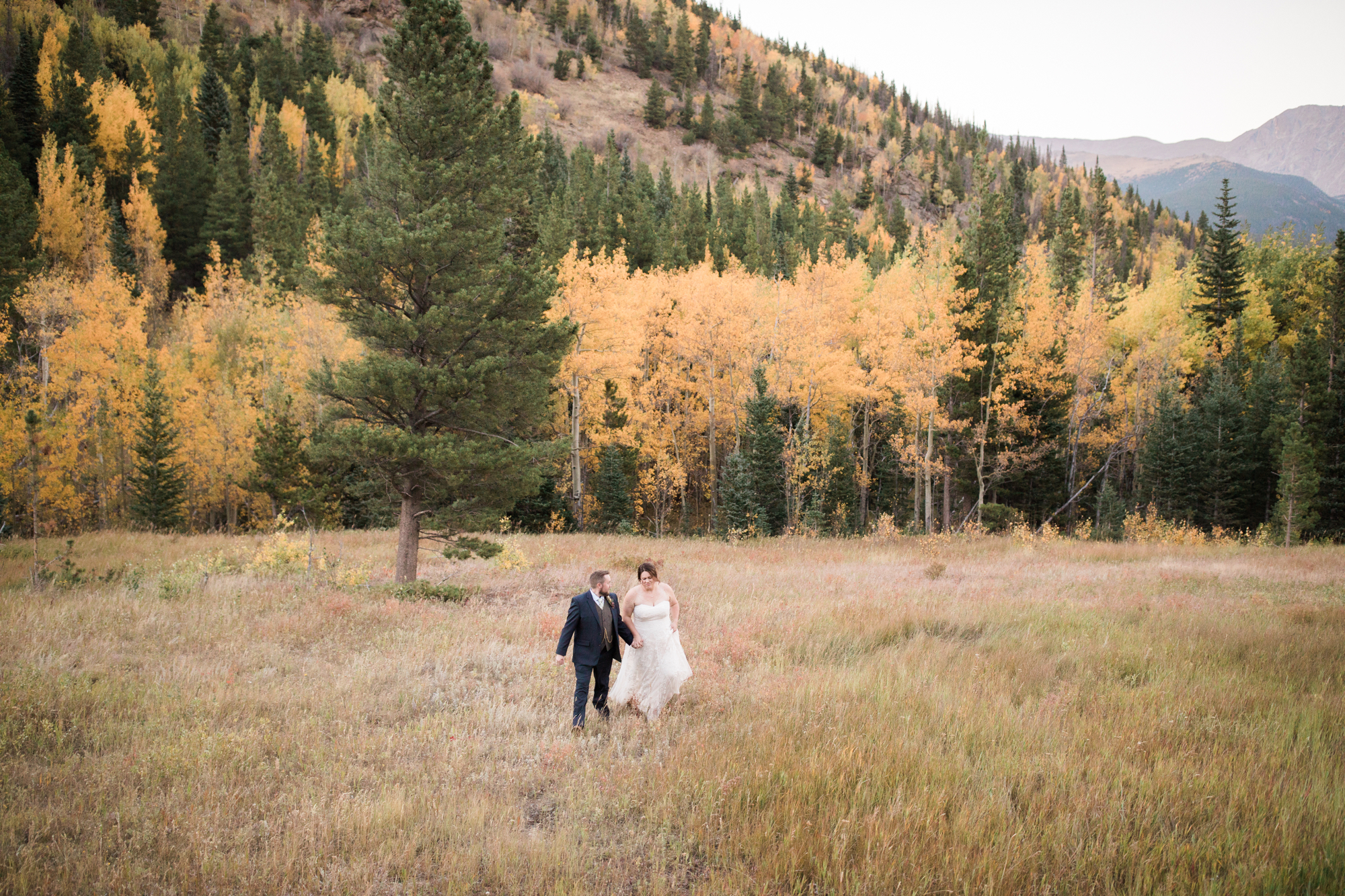 yellow aspen tress bride and groom