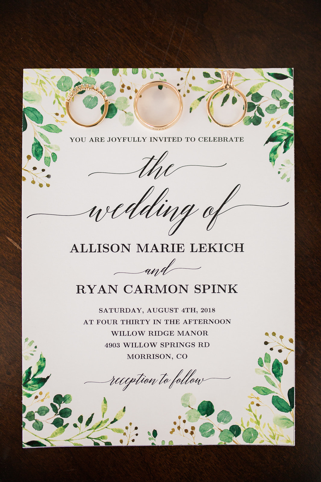 bride and groom invitation with rings