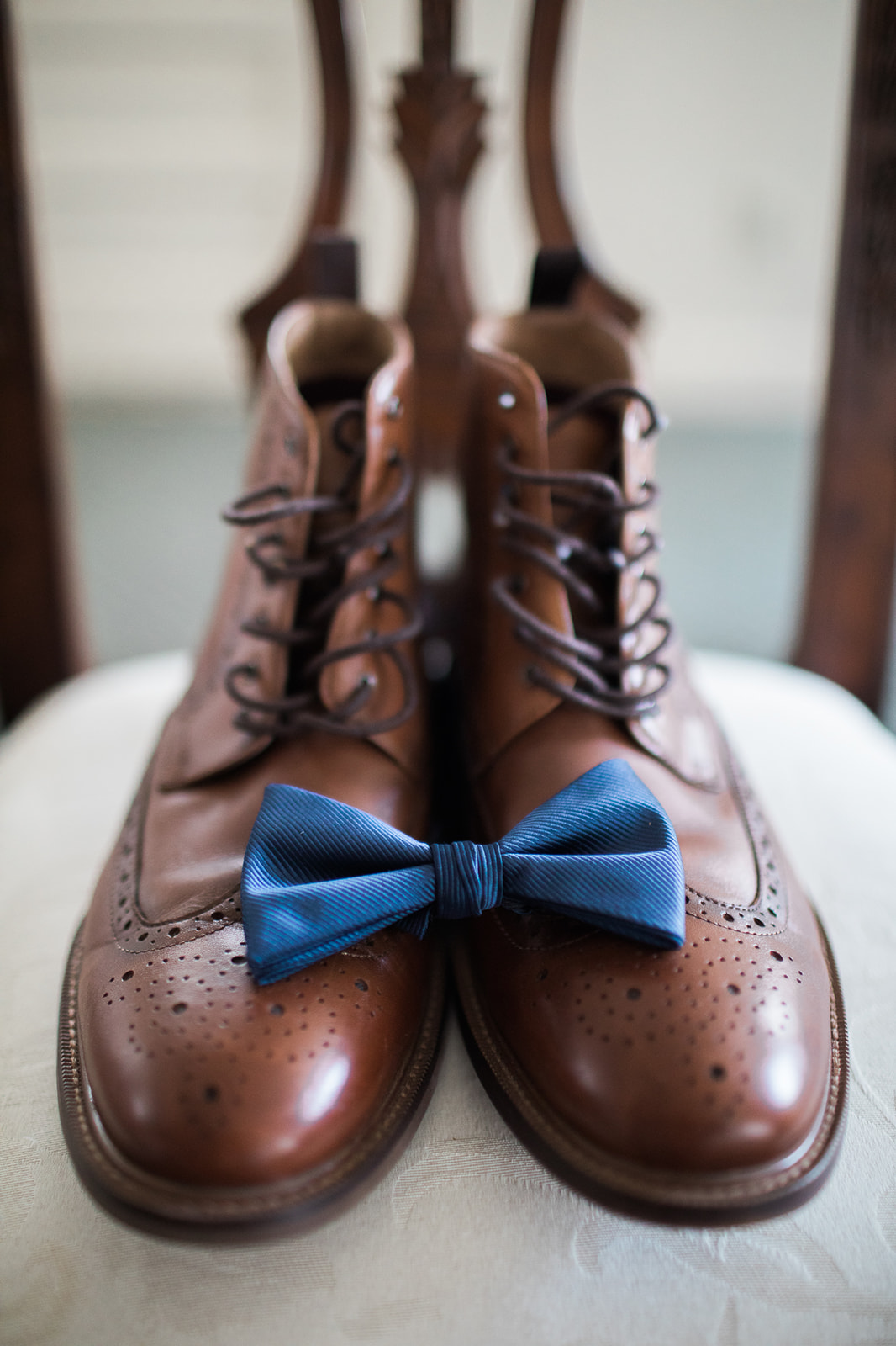 groom's shoes and bowtie for willow manor in morrison colorado