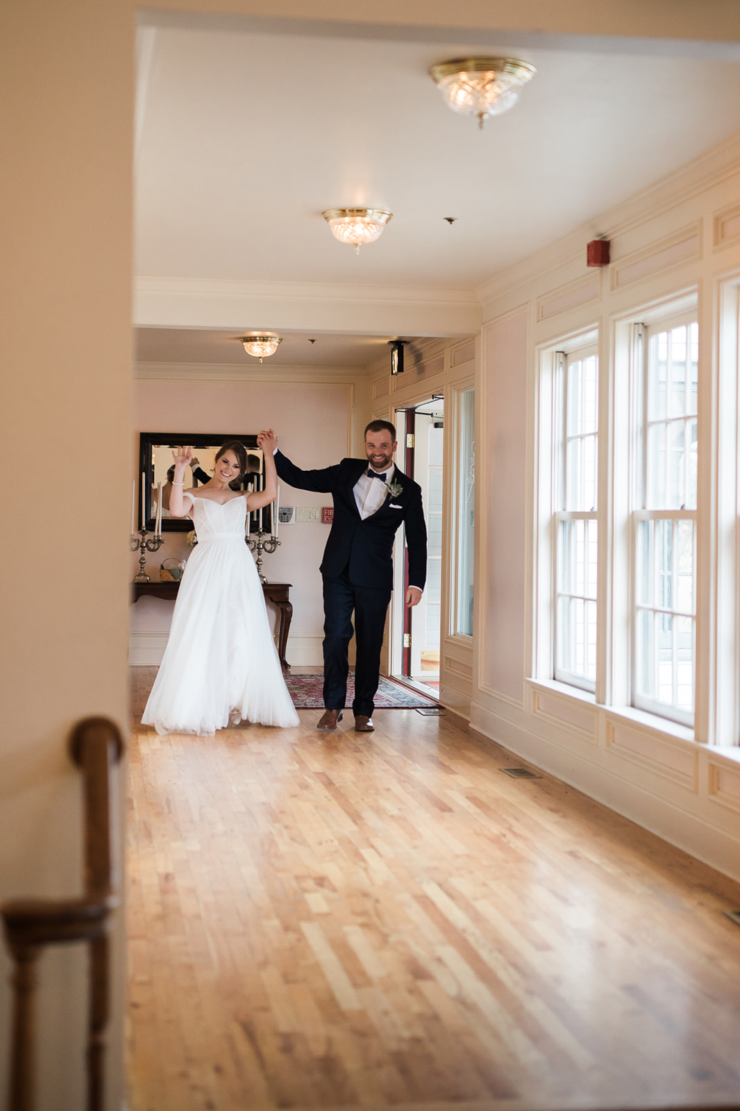 bride and groom grand entrance at willow ridge manor in morrison colorado 