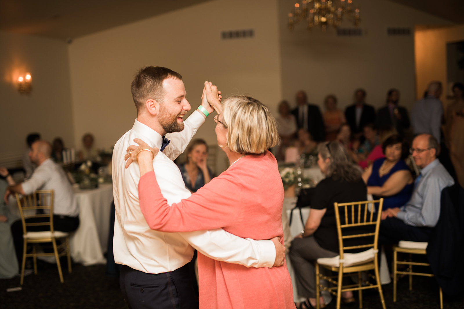 groom and mother dance at colorado wedding recpetion