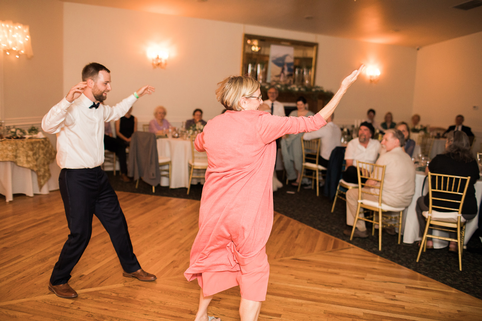 groom and mother dance at colorado wedding recpetion