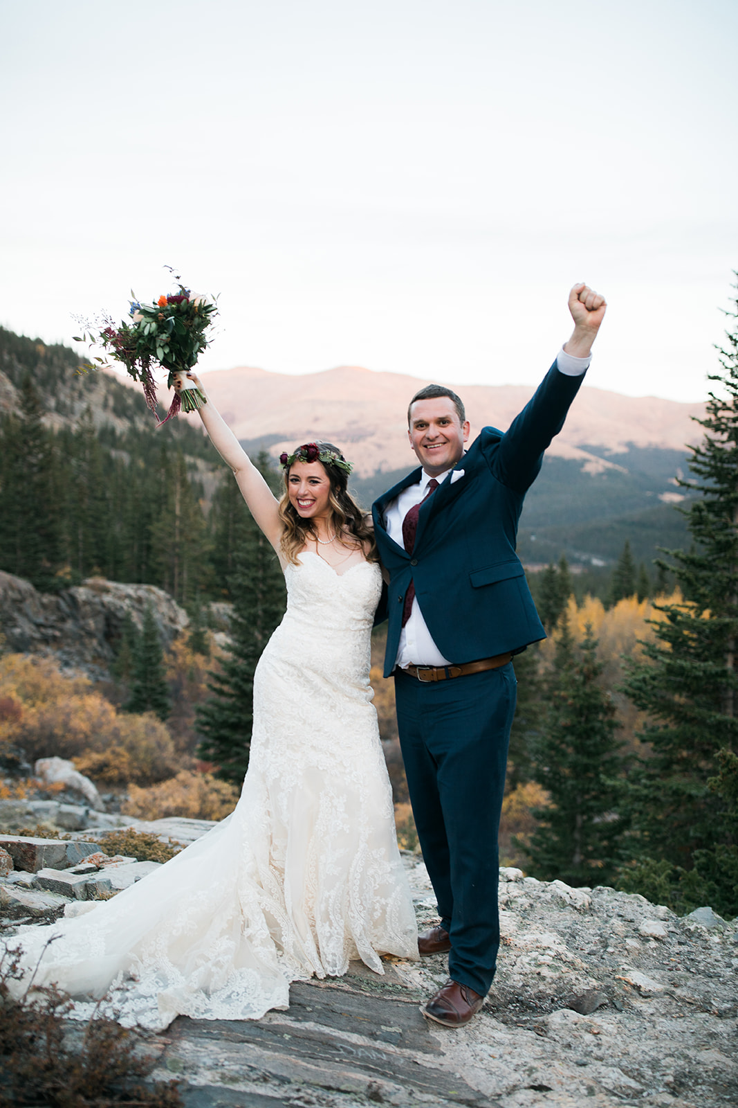 bride and groom in mountain meadow in Breckenridge Colorado