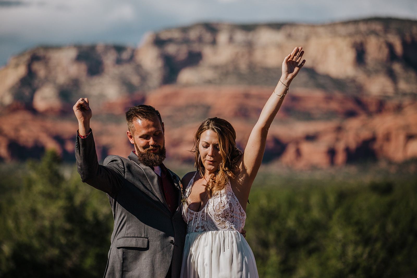 bride and groom celebrate being married in the Arizona desert