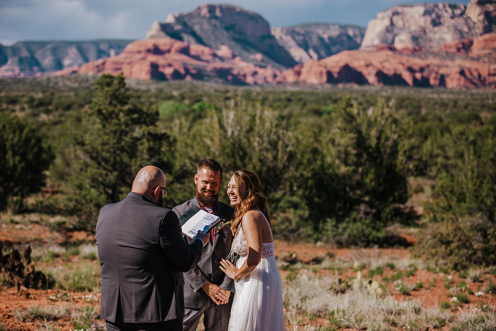 bride and groom exchange vows in intimate Sedona Arizona desert elopement