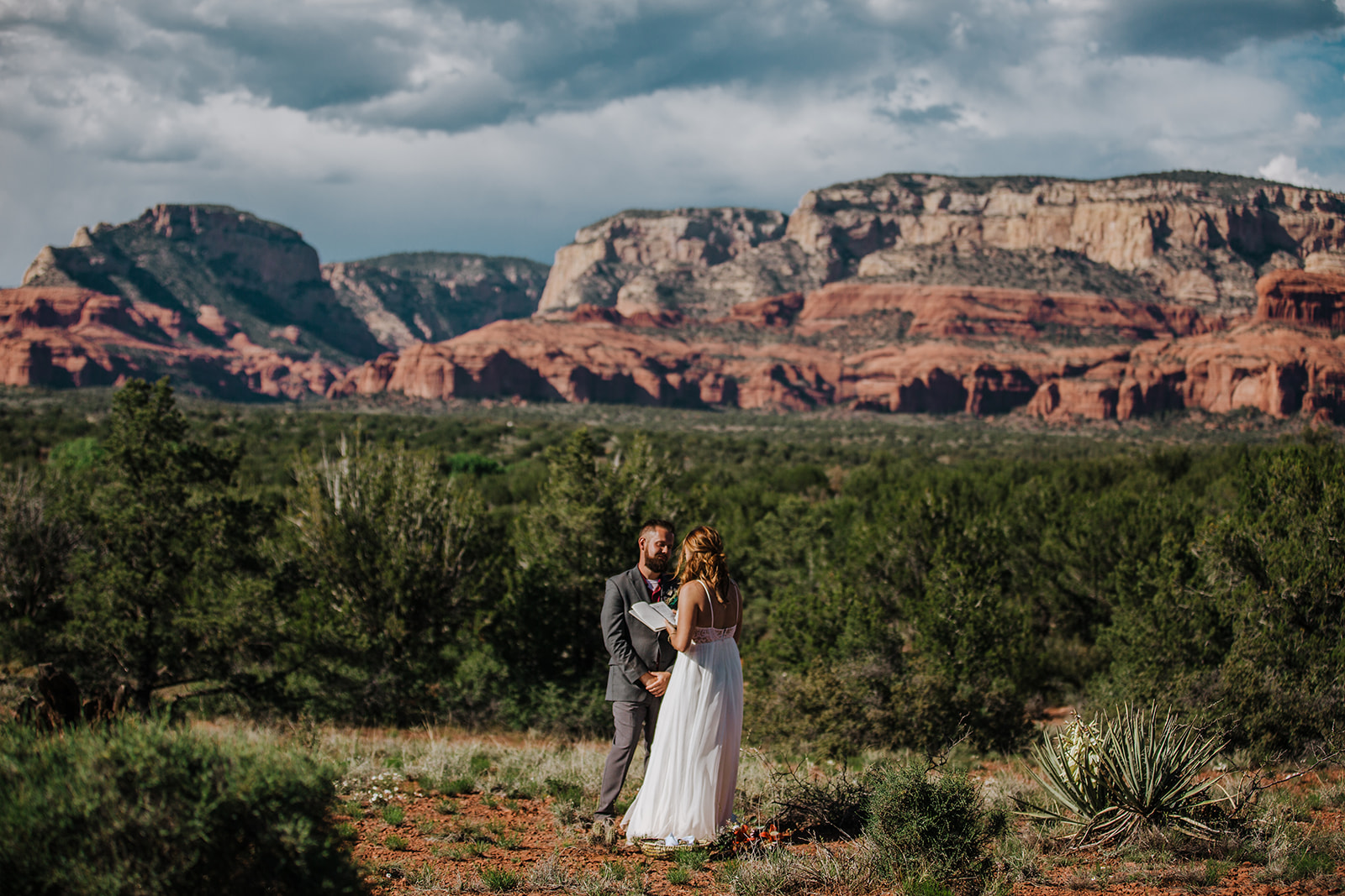gorgeous view of Sedona Arizona desert while bride and groom get married