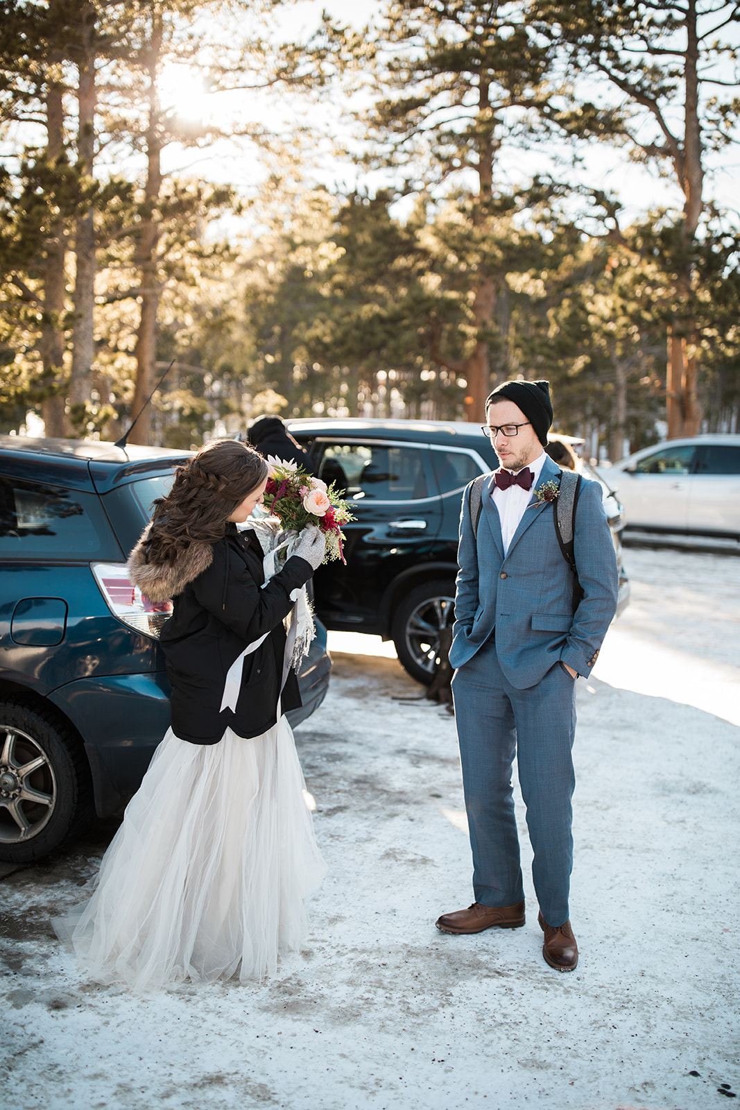 Bride and groom get out of car at Sprague Lake for intimate elopement