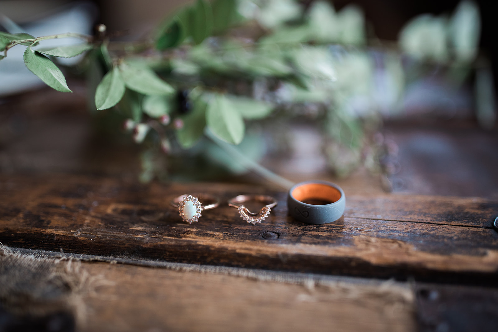 wedding rings on table for elopement