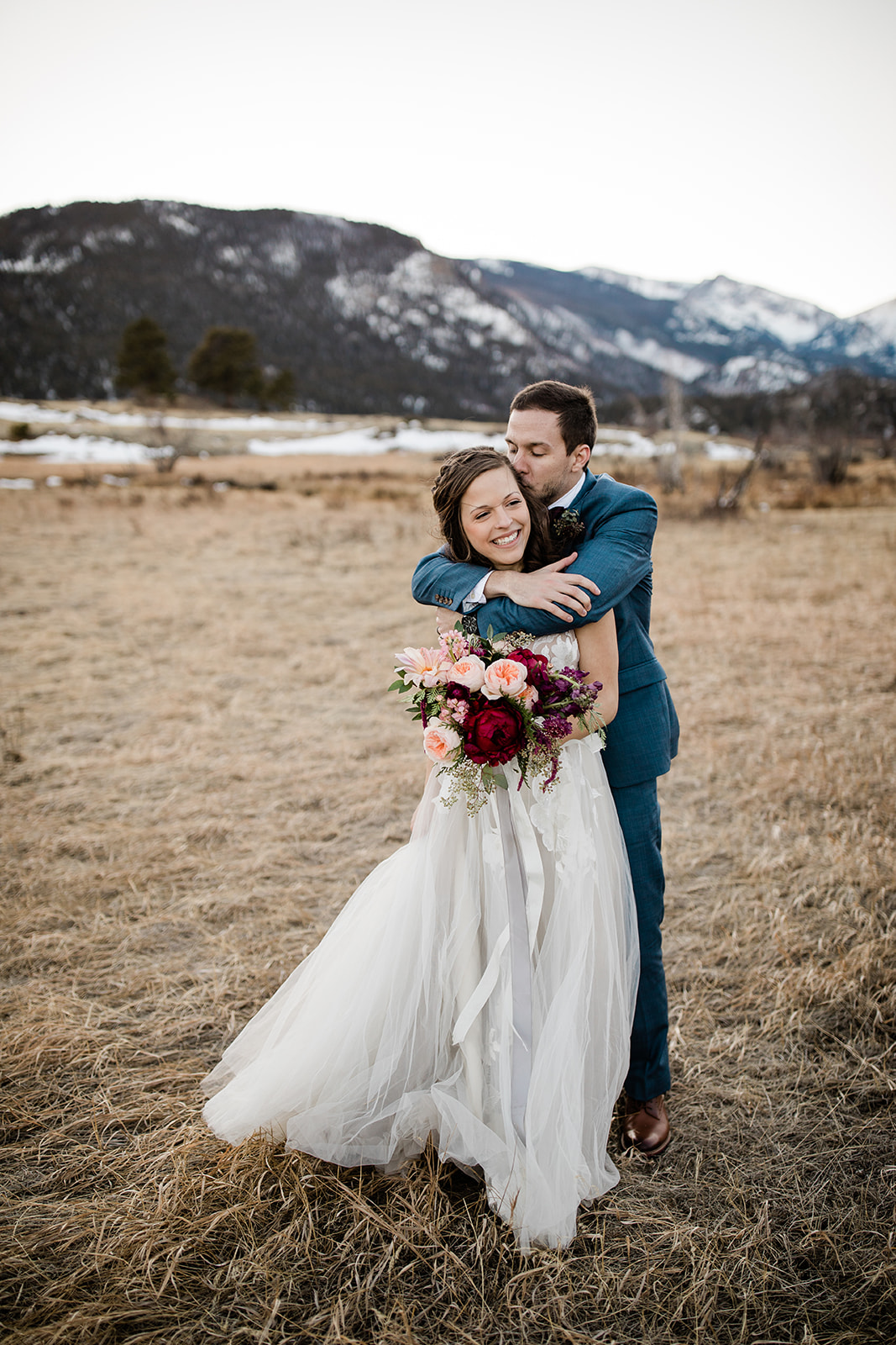 bride and groom in Colorado mountains after elopement
