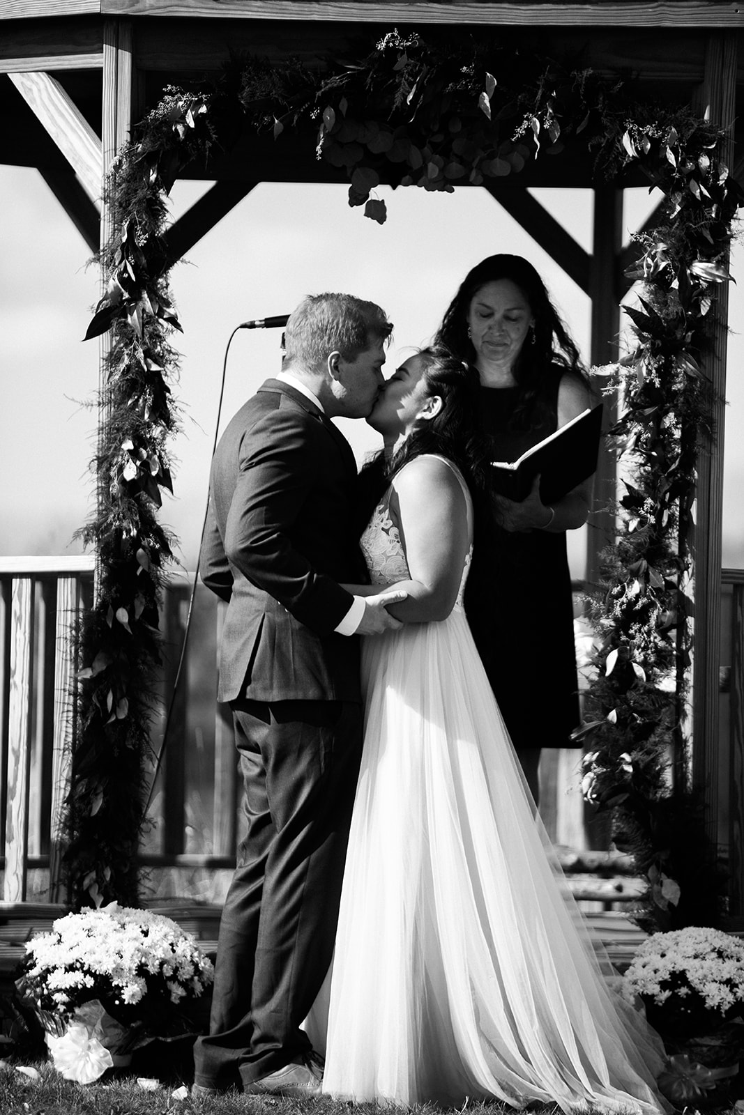 first kiss after outdoor mountain ranch wedding