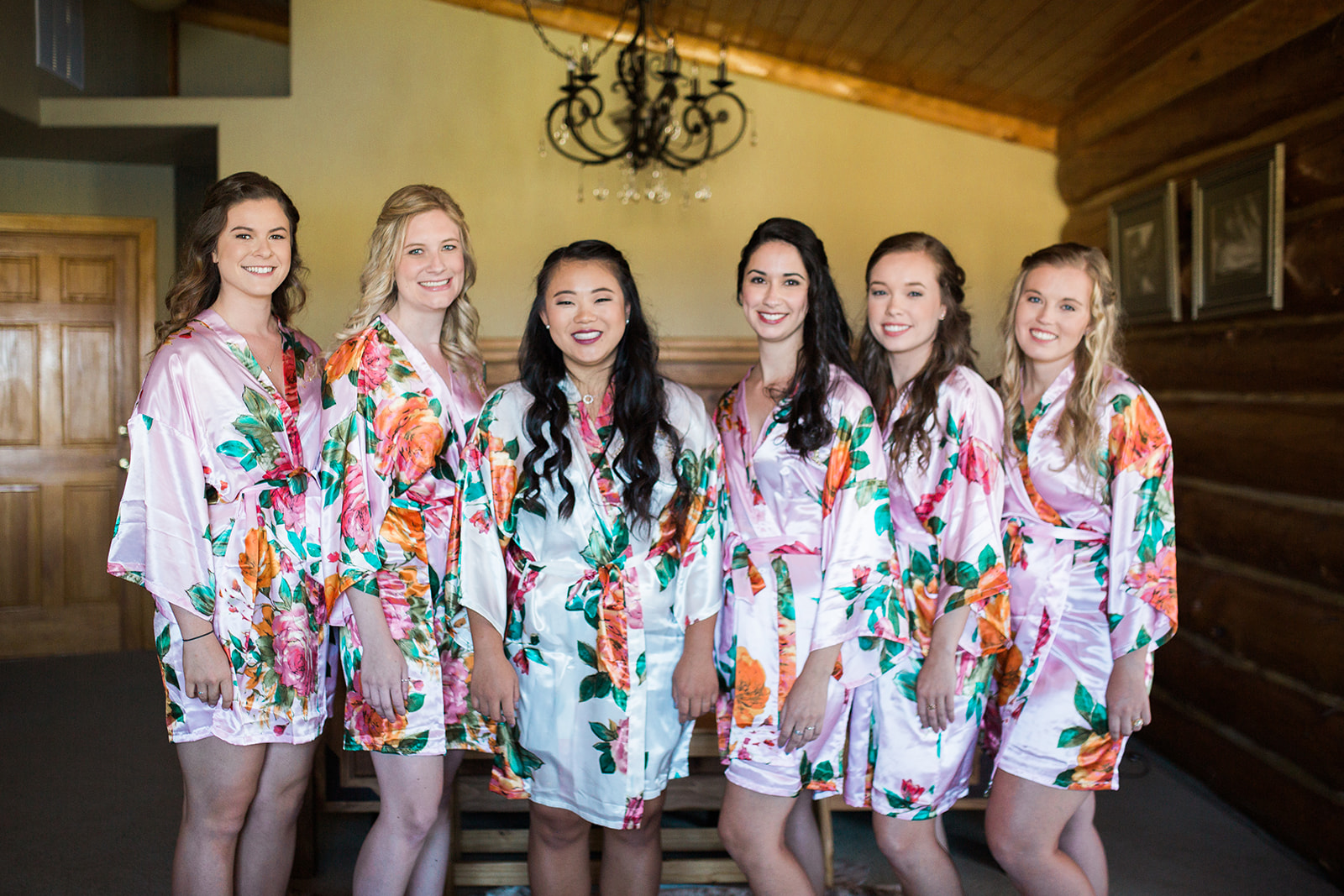 bride and bridesmaids in colorful robes in Crestview Ranch