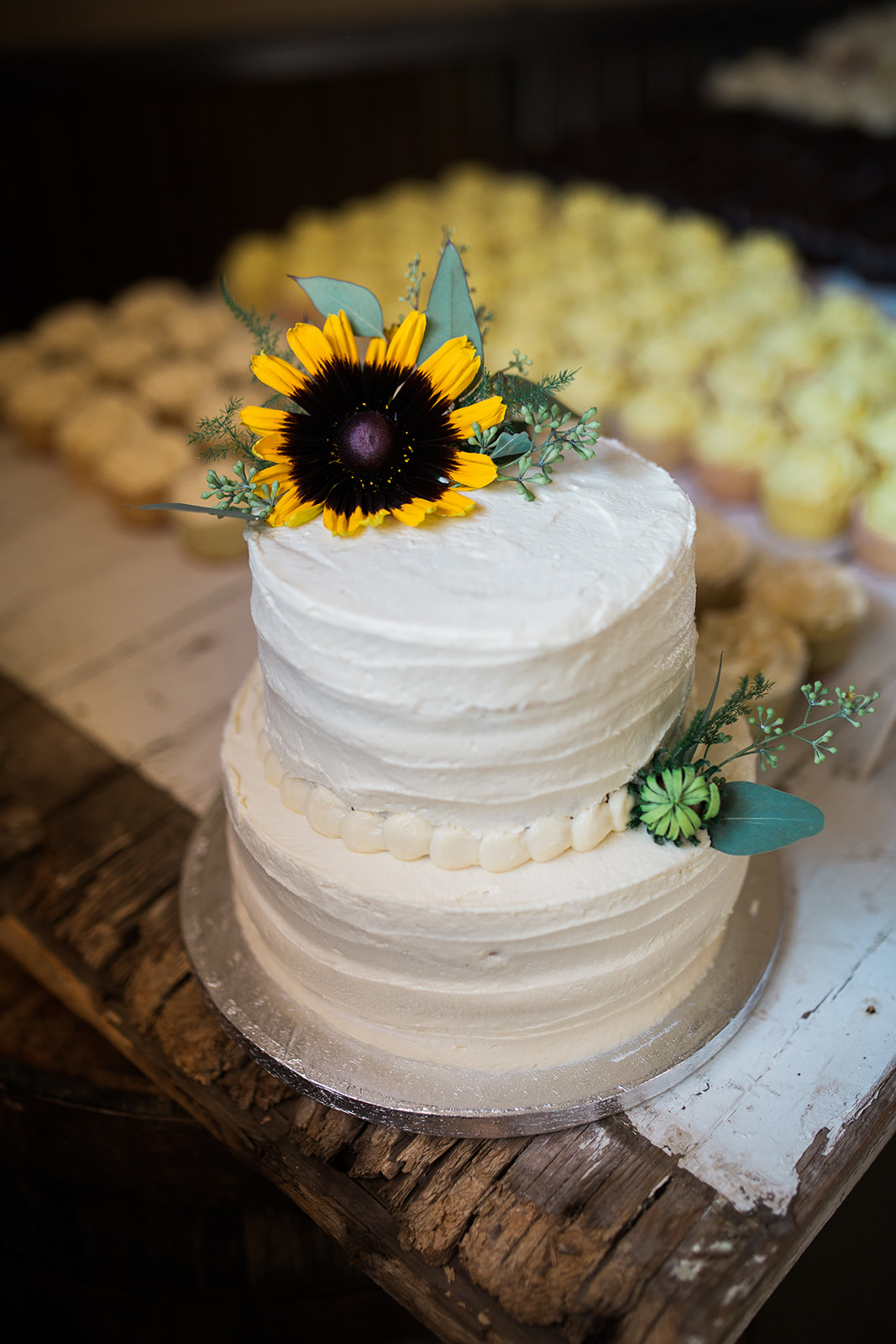 wedding cake with sunflowers for Colorado outdoor ranch wedding