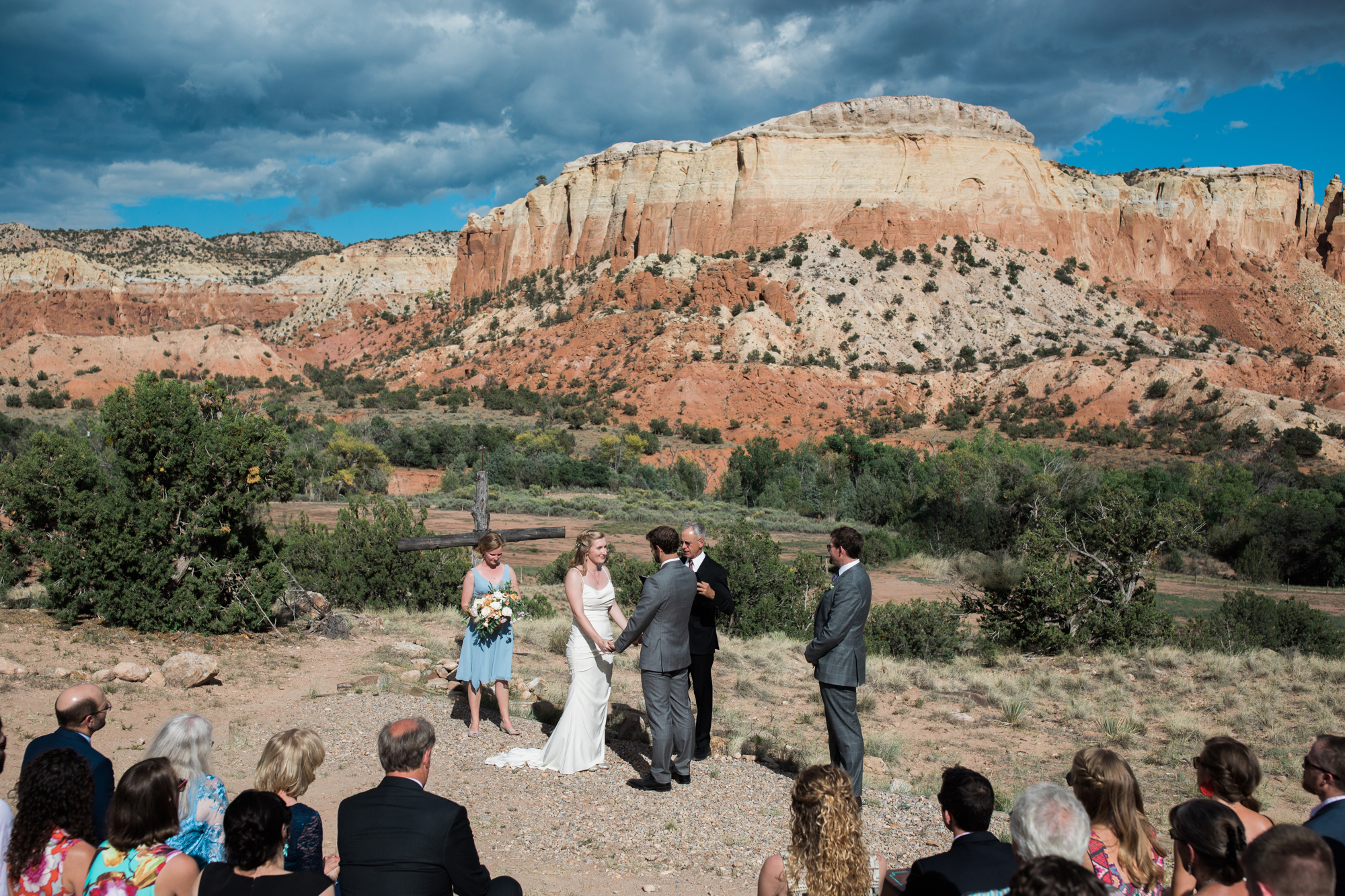bride and groom holding hands at New Mexico wedding