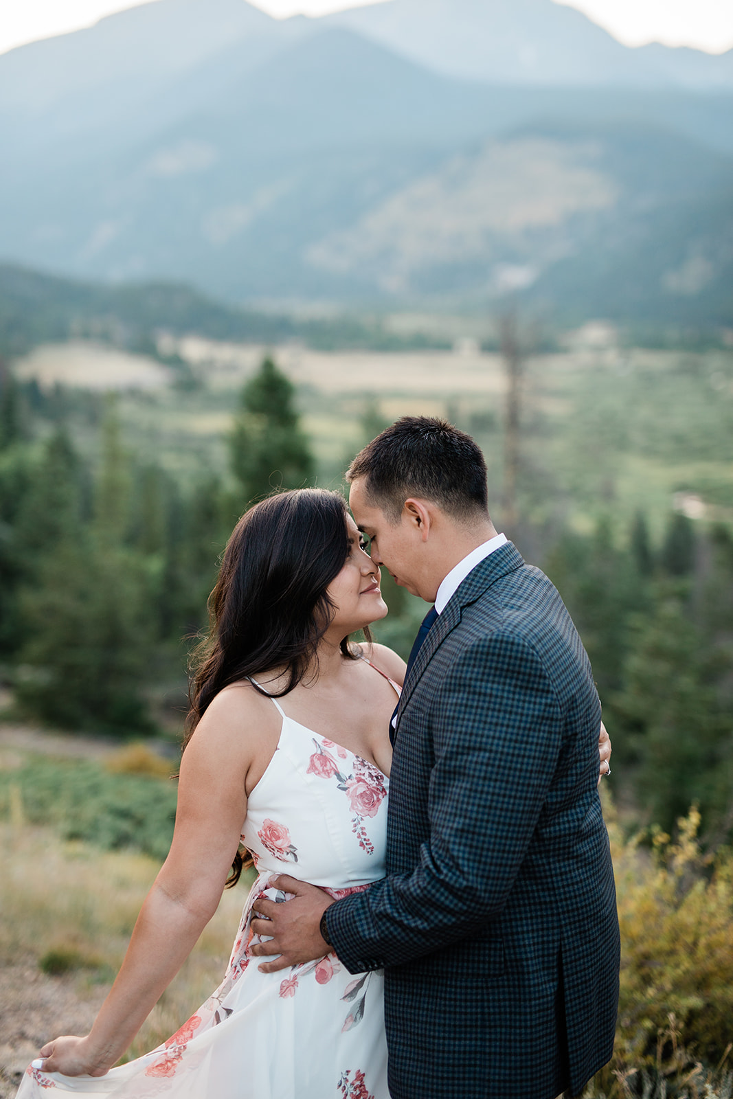 couple walks on trail in Rocky Mountain National Park