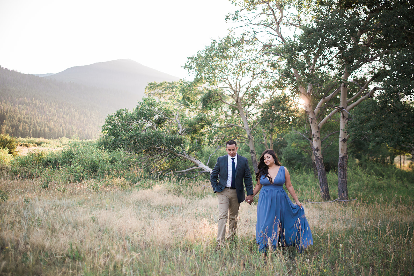 couple walking in Rocky Mountain sunset