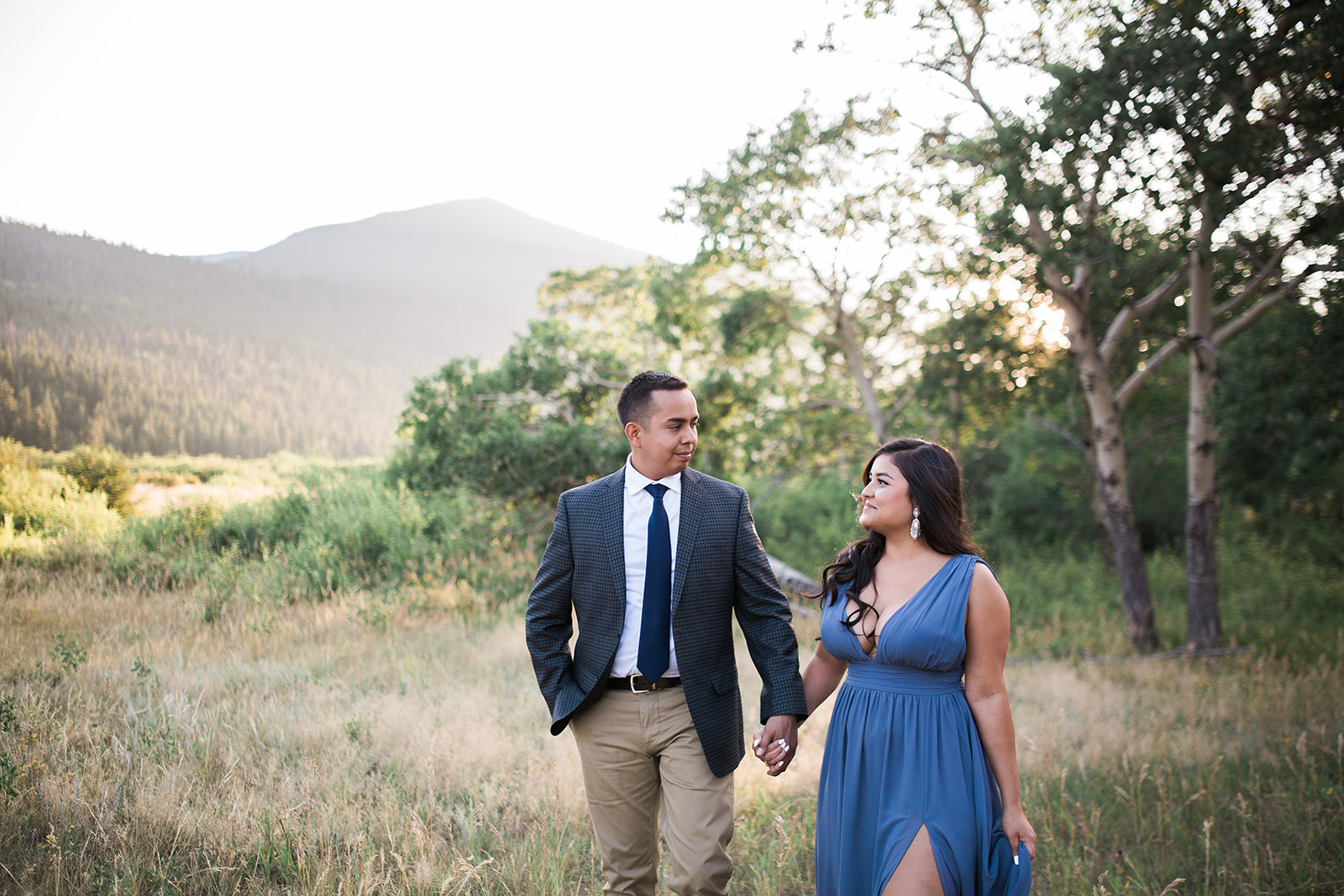 couple walking in Rocky Mountain sunset
