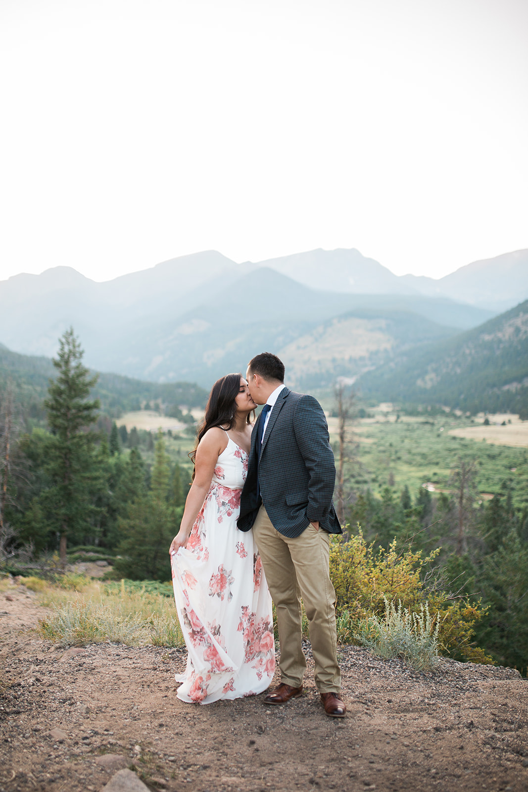 couple walks on trail in Rocky Mountain National Park