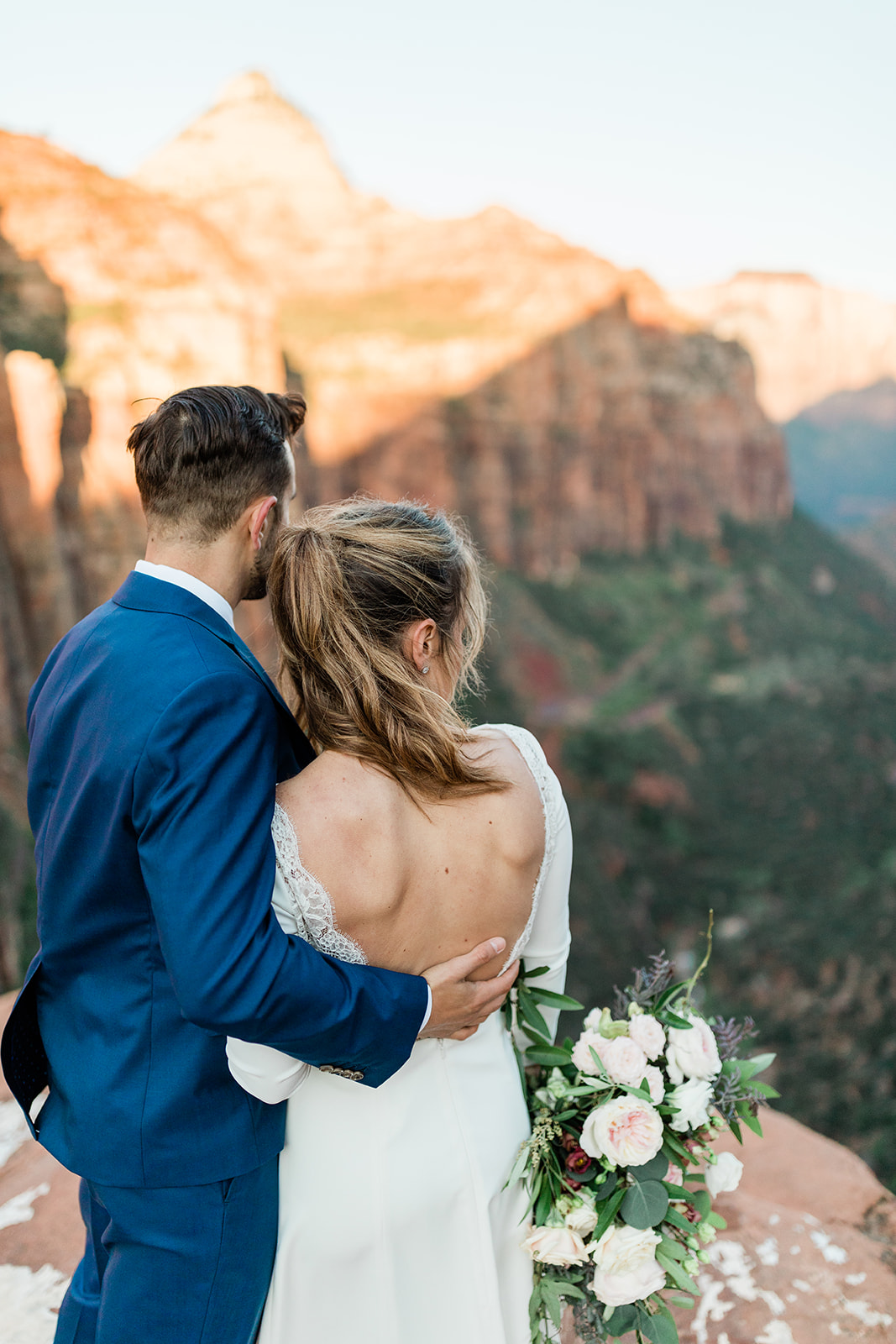 couple overlooking Zion National Park before wedding ceremony