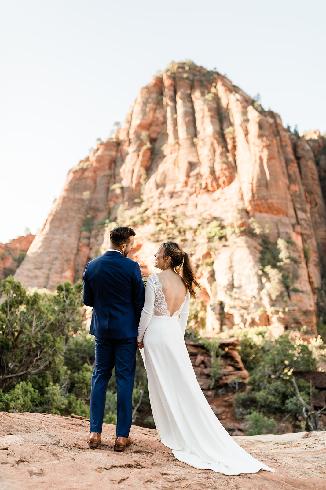 Nick and Kate walk through Zion to their elopement ceremony