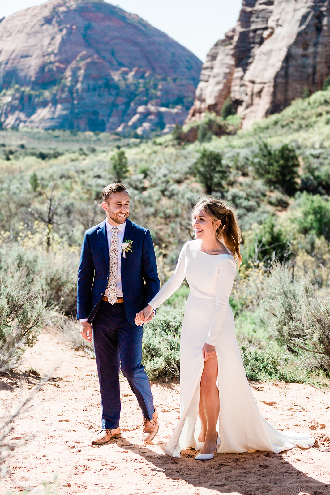 bride and groom celebrate after being married in Zion National Park