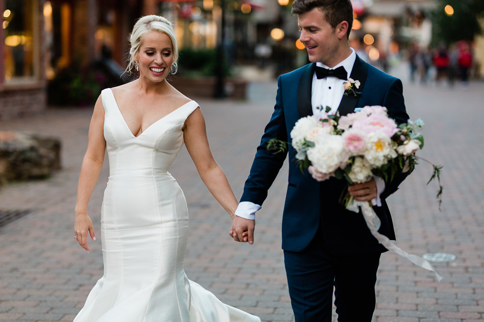 bride and groom portraits in downtown Vail Colorado