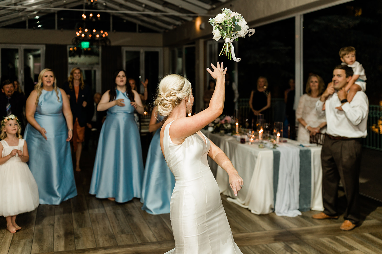 bouquet toss at Vail Colorado wedding reception