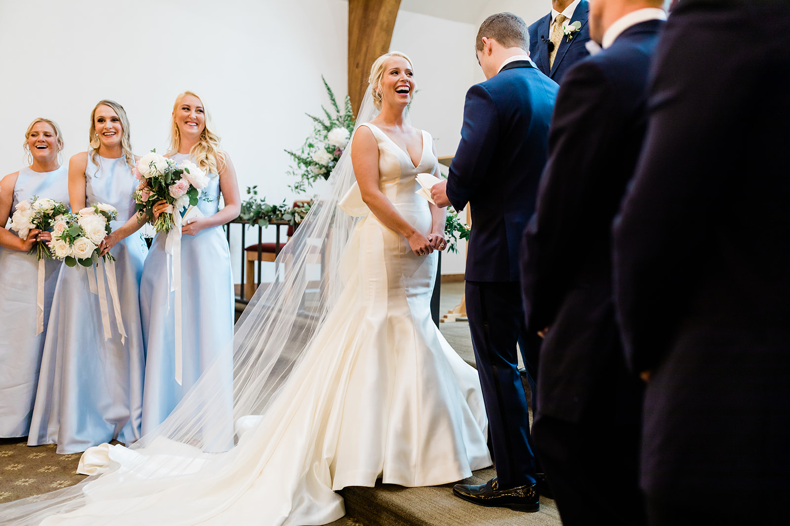 bride laughing during Vail Colorado mountain wedding ceremony