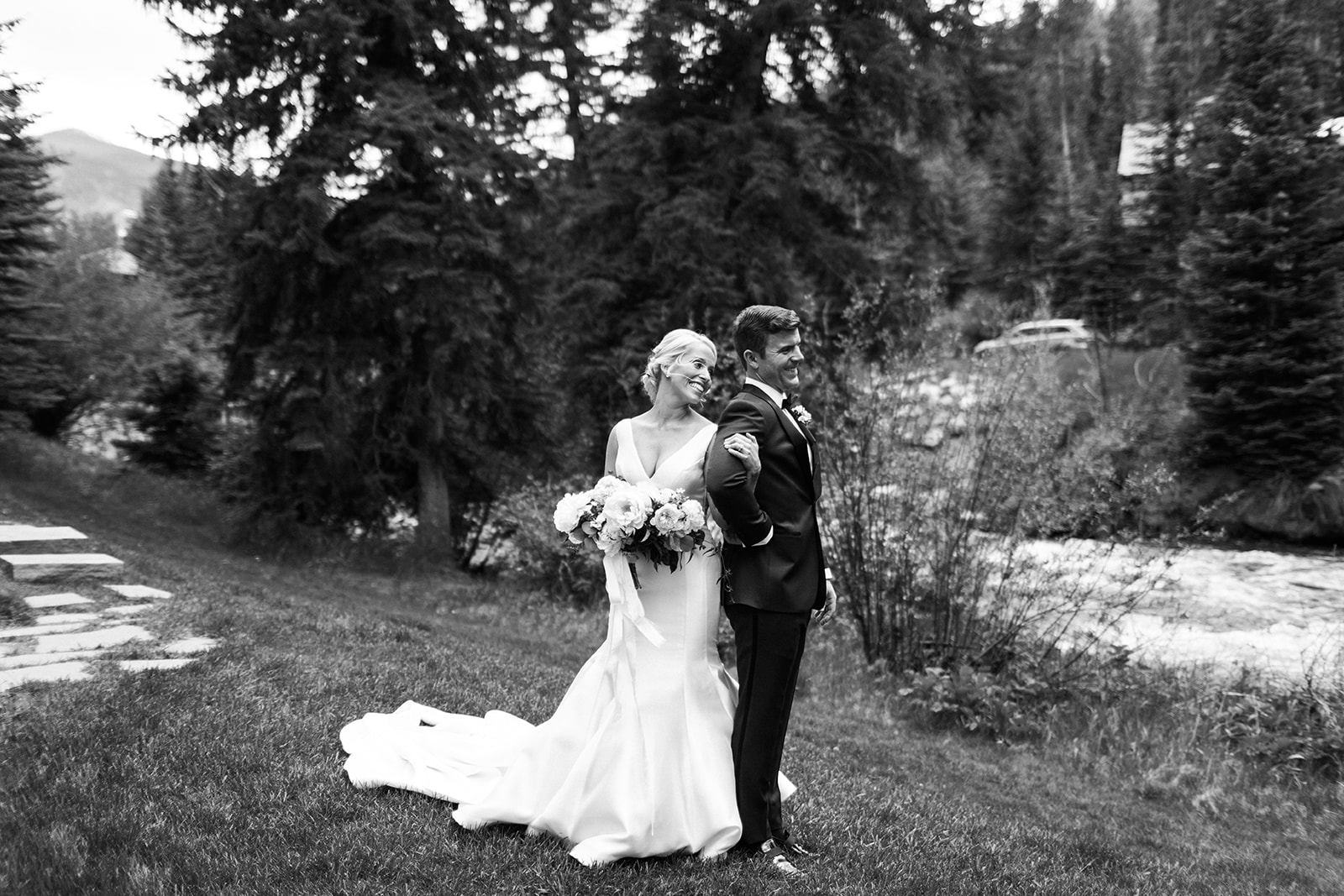 bride first look with groom outside Vail chapel