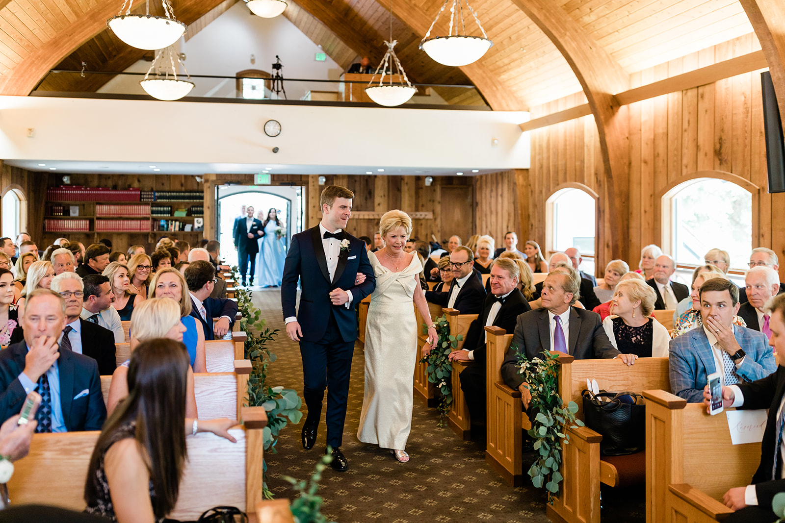 processional in Vail chapel for wedding ceremony