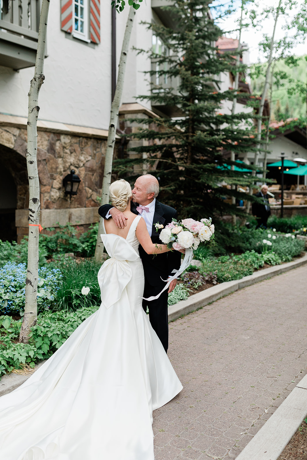 bride first look with father in Vail Colorado